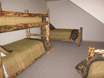 3rd floor bedroom with 4 twin beds
